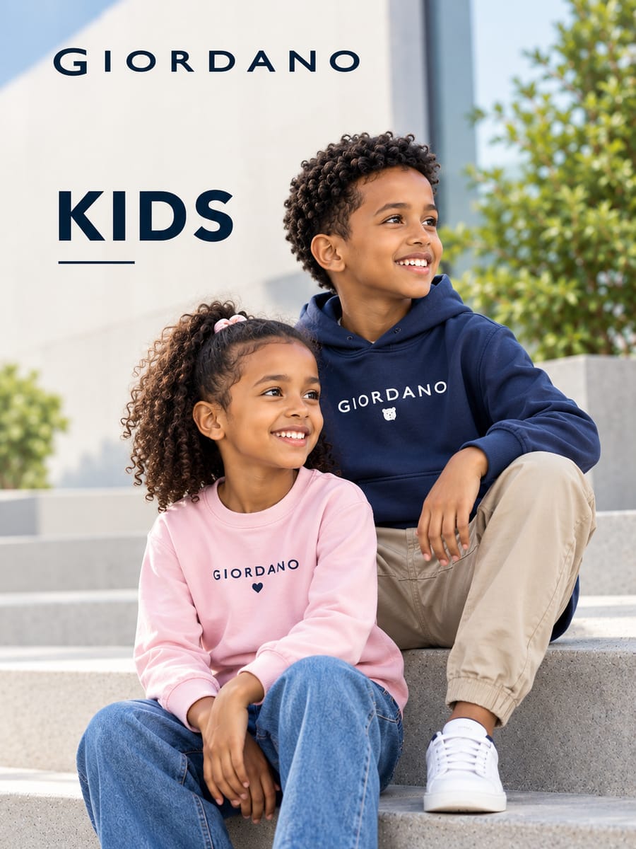 Giordano Kids – girl in a pink Giordano sweatshirt and boy in a navy Giordano hoodie